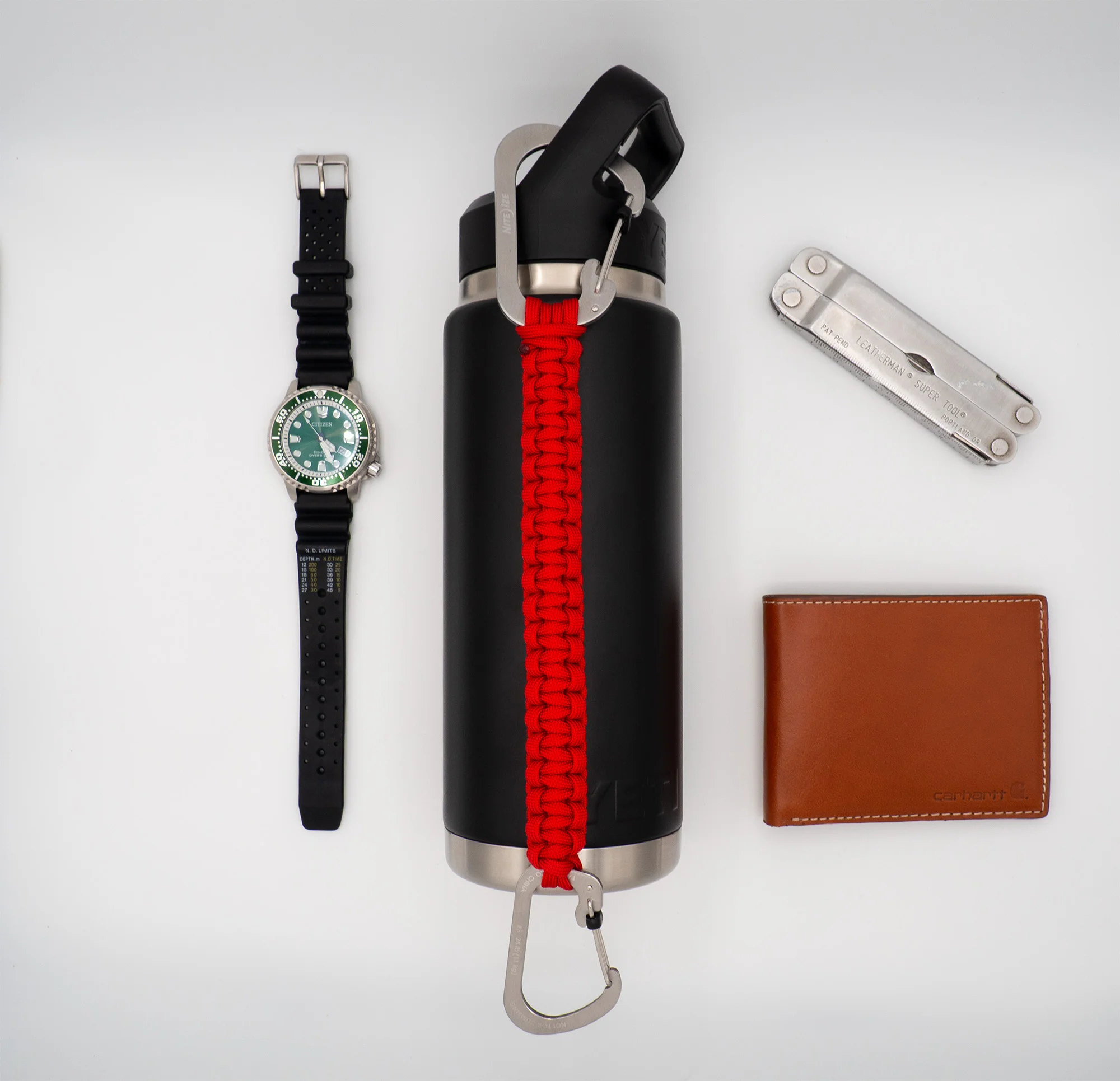 Red Thirstlock Anchor bottle leash with everyday carry items